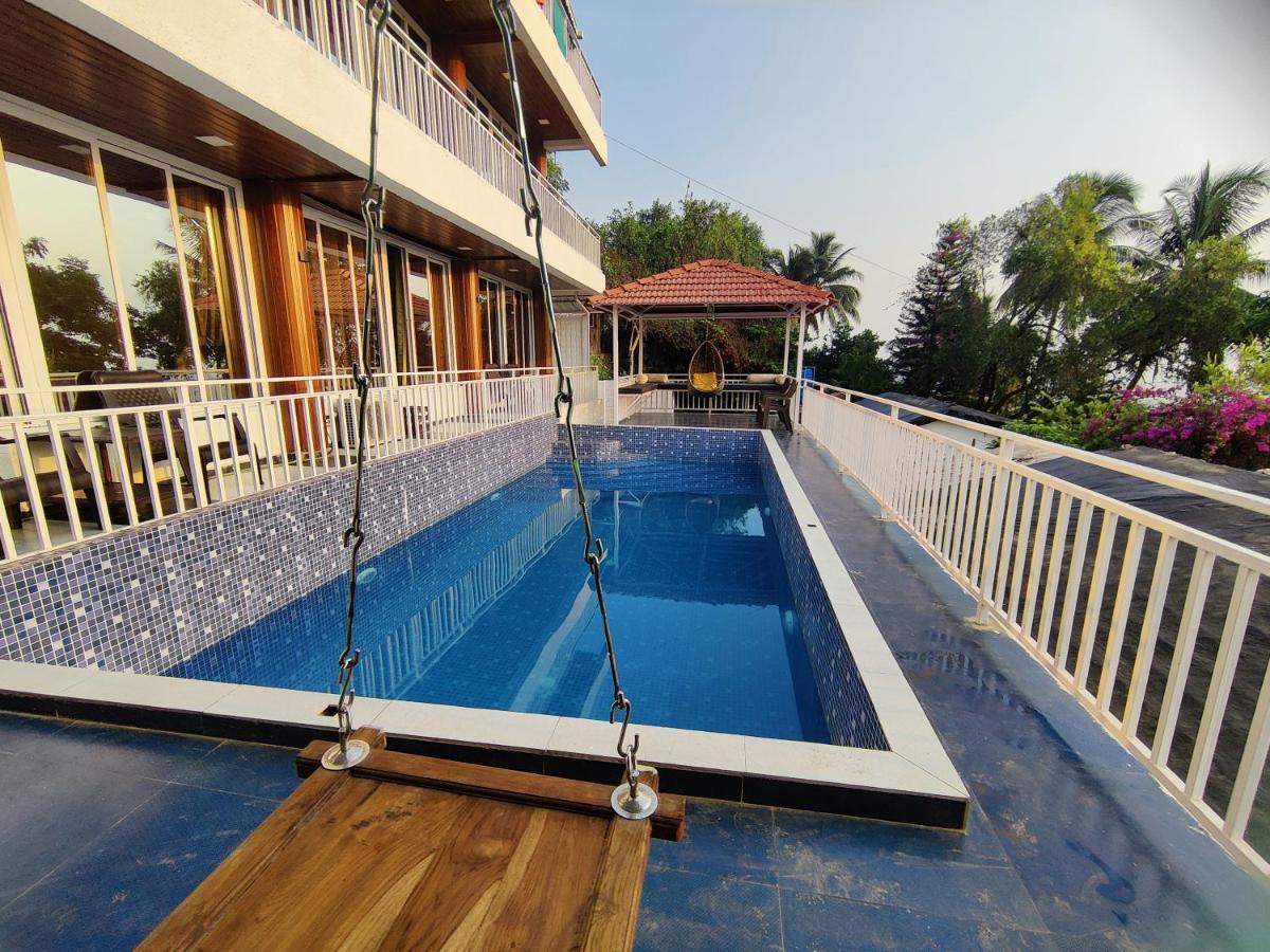 Whitehouse Homestay By Oxystays Hospitality อลีบาก ภายนอก รูปภาพ